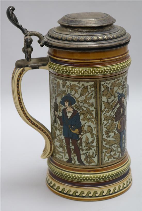 A Mettlach stein, with white metal lid 23cm.